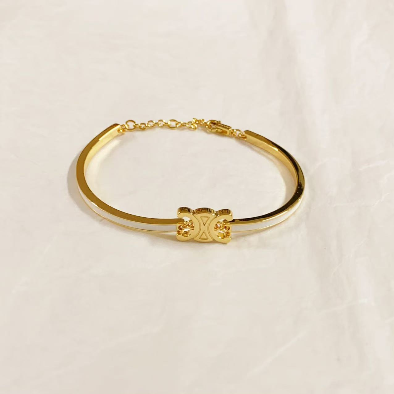 셀린느 트리웅프 아티큘레이티드 팔찌 (컬러 화이트,핑크)